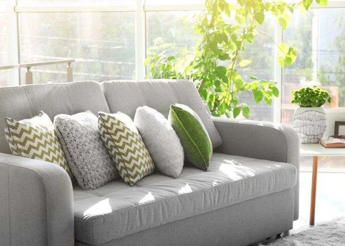 Sofa,With,Colorful,Pillows,In,Room