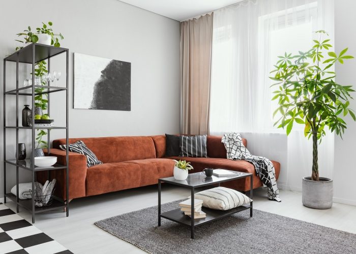 Trendy,Living,Room,Interior,With,Brown,Corner,Sofa,With,Black